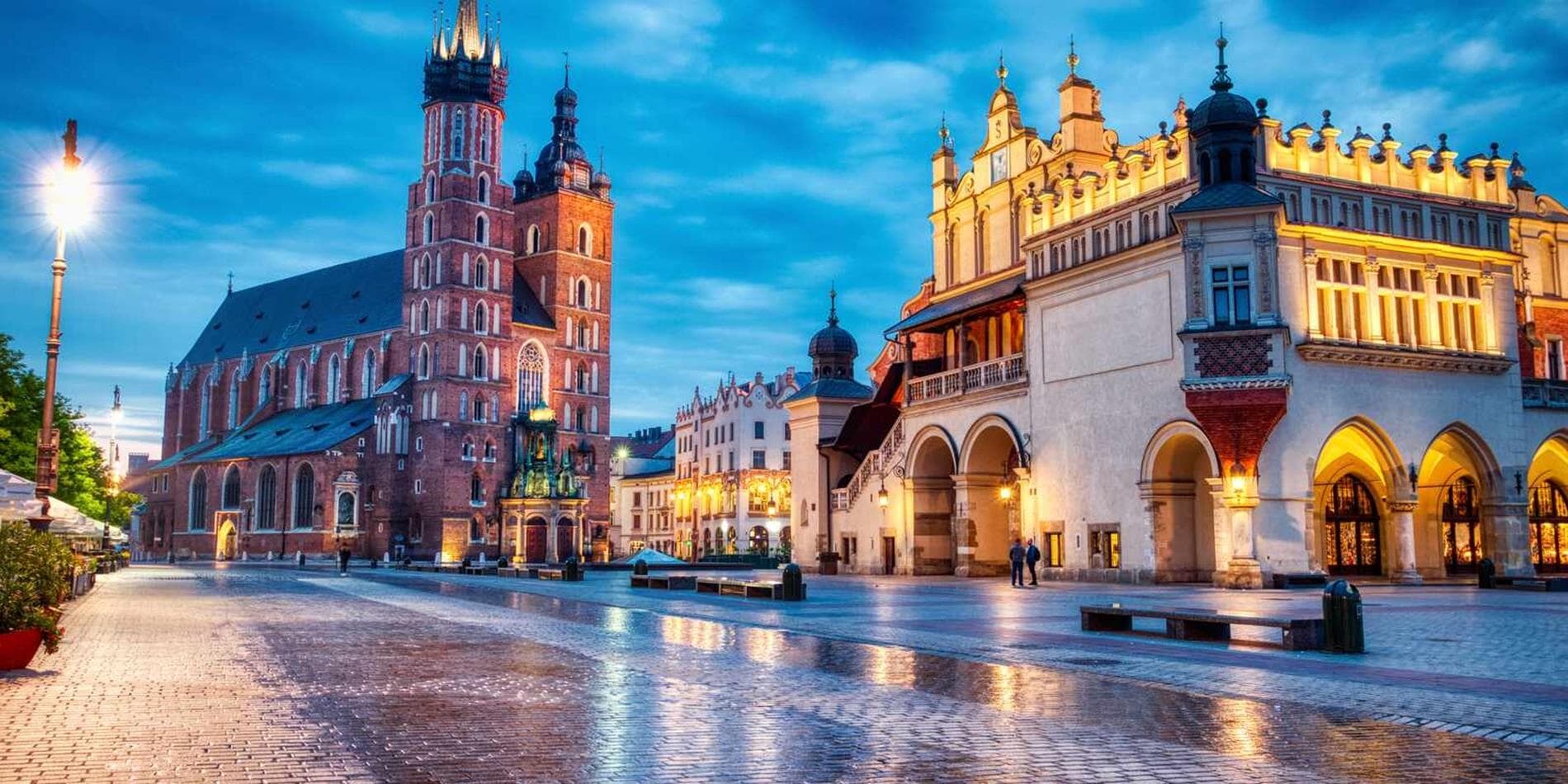 Town square at night in Krakow, Poland